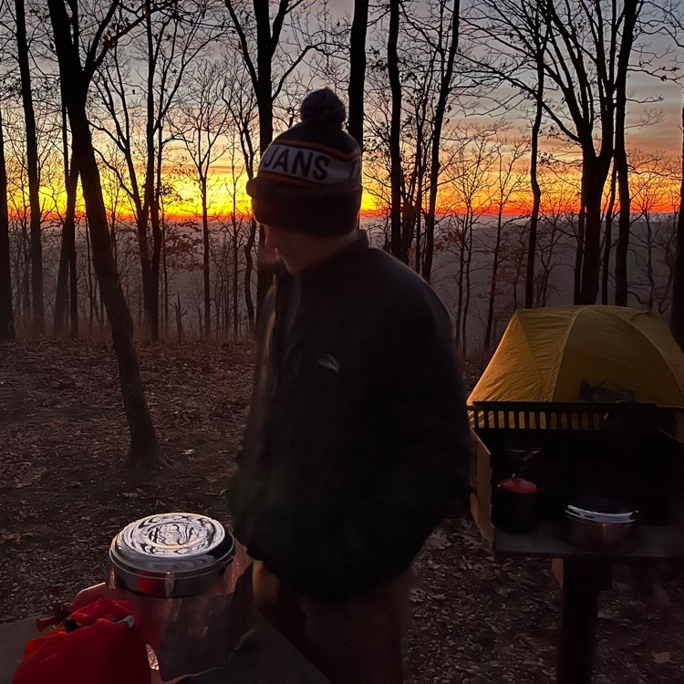 Jude cooks dinner with an unbelievable sunset